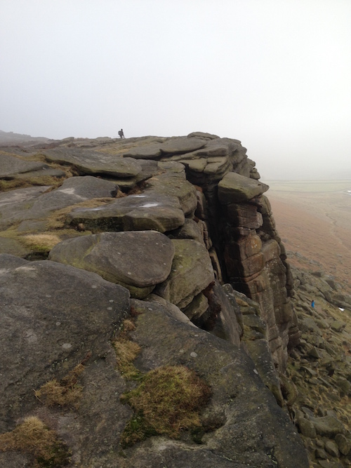 a walker in the distance on Stanage Edge Derbyshire
